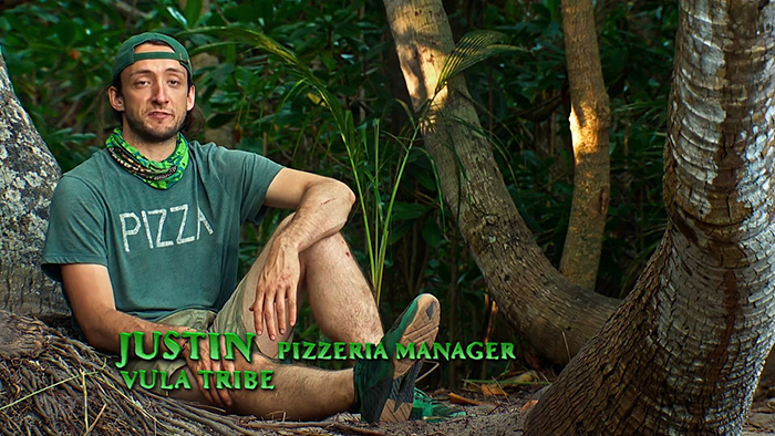 Justin from Survivor 48 wearing a "PIZZA" T-shirt